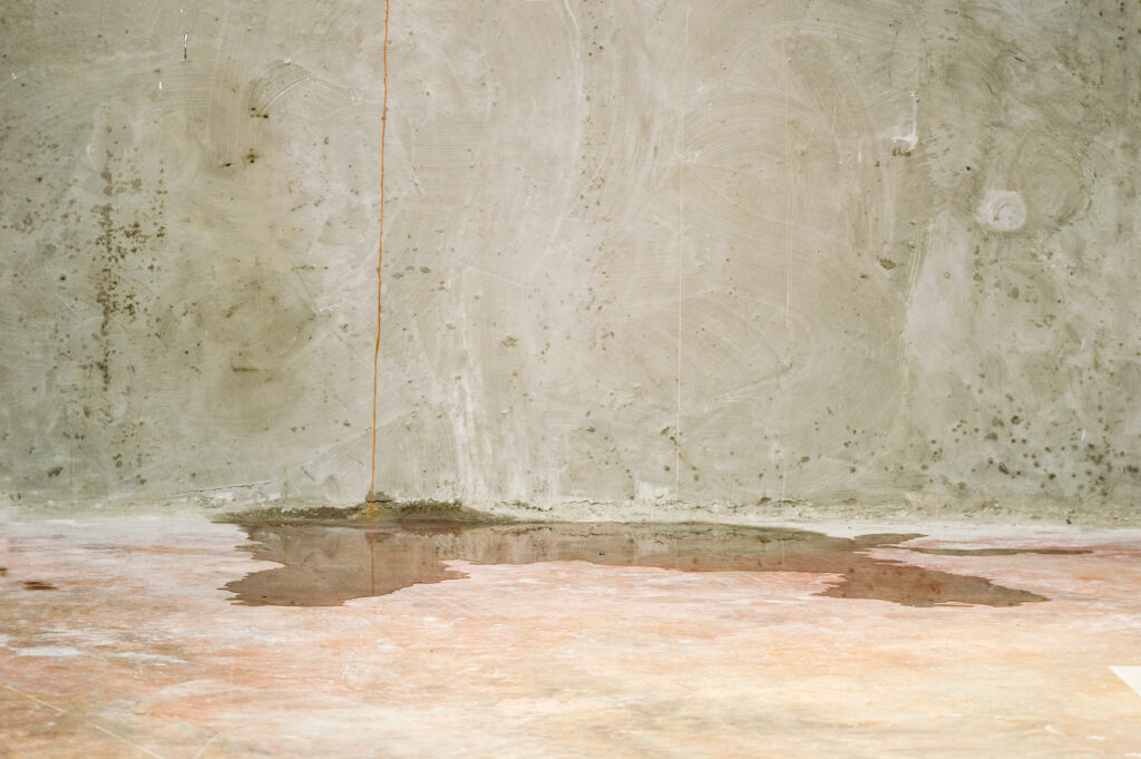 can water come up through concrete basement floor