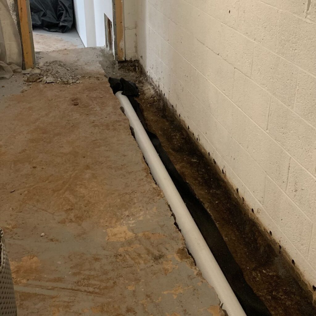 interior perimeter basement drain system