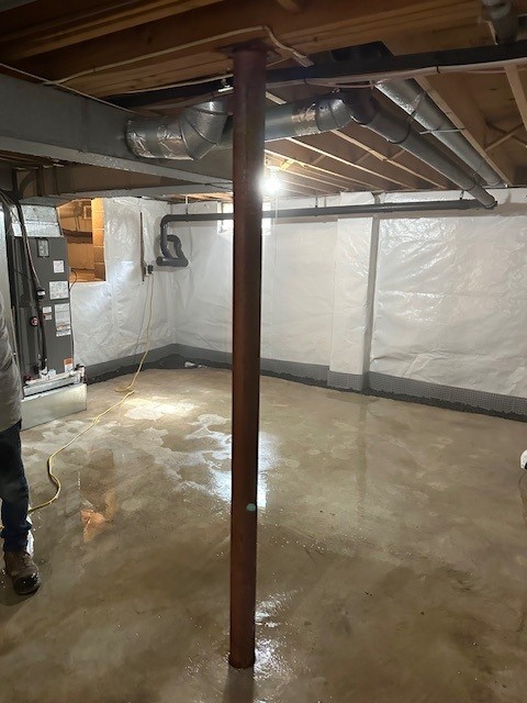 how does an interior basement drainage system work